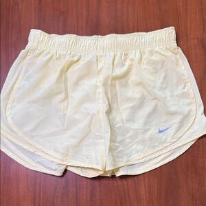 Nike Women’s dri fit Athletic Running Shorts in yellow